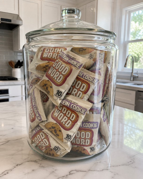 A glass jar filled with Good Word cookies